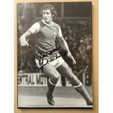Signed picture of Frank McLintock the Arsenal footballer.